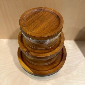Set of three Pyrex glass containers with wood lids